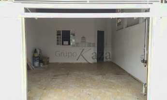 Imagem 6: Casa Térrea em meio lote a venda 3 quartos 2 Garagem Portão Automático Basculante Jardim