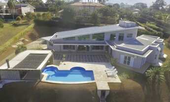 Imagem 2: Casa de condomínio para aluguel possui 460 metros quadrados com 4 quartos