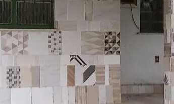 Imagem 7: Terreno c 3 casa murado