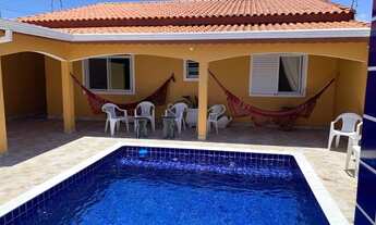 Imagem 4: Casa térrea para venda com piscina e cascata em Balneário Oásis - Peruíbe - SP