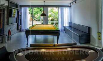 Imagem 4: Casa com arquitetura moderna no condomínio Rosa Internacional