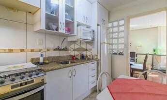 Imagem 5: Apartamento de 2 quartos com dependência e garagem no Auxiliadora próximo a Carlos Gomes