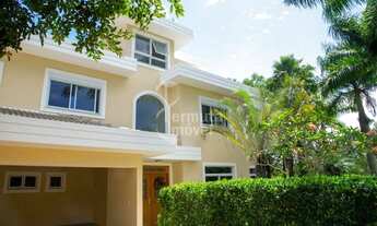 Imagem 3: Casa de esquina para venda com 519m², 5 suítes com closet, piscina com jacuzzi e 6 vagas n