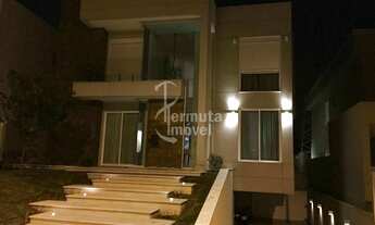 Imagem 3: Casa para venda mobiliada com 480m², 4 suítes, 6 vagas e jardim no Residencial Villa Solai