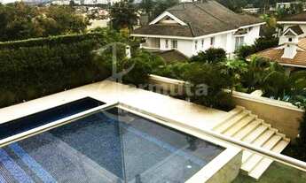 Imagem 2: Casa para locação com 1500m², 5 suítes, 5 vagas, ar condicionado, piscina, sala de TV e ad