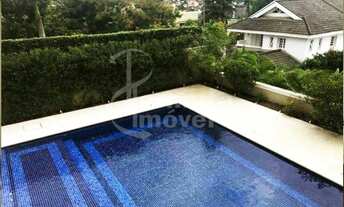 Imagem 3: Casa para locação com 1500m², 5 suítes, 5 vagas, ar condicionado, piscina, sala de TV e ad