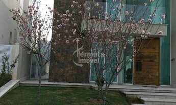 Imagem 2: Casa para venda mobiliada com 480m², 4 suítes, 6 vagas e jardim no Residencial Villa Solai