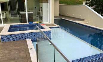 Imagem 3: Casa para venda mobiliada com 470m², 4 suítes, 5 banheiros e piscina no Residencial Villa