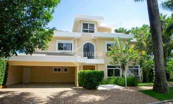 Imagem 2: Casa de esquina para venda com 519m², 5 suítes com closet, piscina com jacuzzi e 6 vagas n