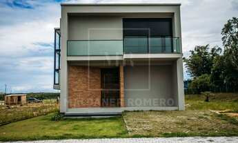 Imagem 3: Casa com arquitetura moderna no condomínio Rosa Internacional