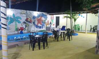 Imagem 6: Área de lazer com piscina e casa