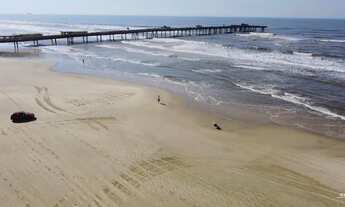 Imagem 4: Seu paraíso à beira-mar em Tramandaí: Duplex dos sonhos por apenas R$410 mil!