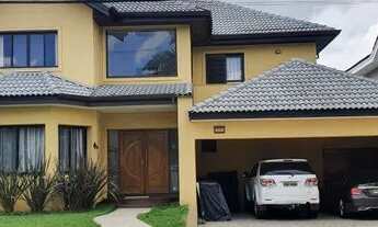 Imagem: Casa em Condomínio fechado. Sendo 4 suítes