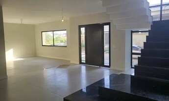 Imagem 2: Casa de condomínio para venda possui 450 metros quadrados com 5 quartos