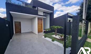 Imagem 2: Viva em Estilo e Conforto: Imóvel com Churrasqueira, Cozinha Moderna, Jardim Encantador e