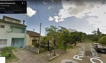 Imagem 2: Casa, estilo sobrado, com 03 dormitórios (01suíte) e 02 vagas, no bairro Hípica, em Porto