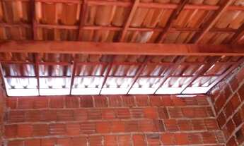 Imagem 2: Terreno com casa em construção