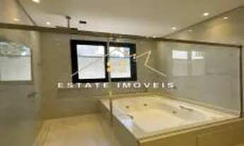 Imagem 2: Casa de condomínio para venda tem 305 metros quadrados com 4 quartos