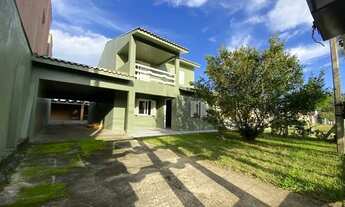 Imagem 2: Casa de dois pisos em Tramandaí, com 3 dormitórios e suíte! Aceita imóvel em Guaíba como p