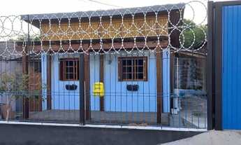 Imagem 4: Casa térrea de 2 dormitórios, living, cozinha, churrasqueira, área de serviço, banheiro so