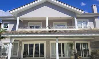 Imagem 5: Sobrado com 4 Suítes com 455m², Locação R$ 13.520,00 o pacote. Condomínio Morada dos Pássa