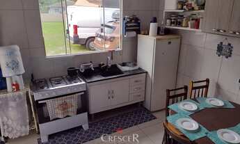 Imagem 6: Amplo terreno com casa averbada para venda em Matinhos