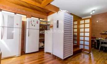 Imagem 3: Casa Residencial com 4 dormitórios, sendo 2 suítes, e 4 vagas de garagem no bairro Tristez