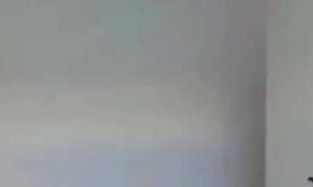 Imagem 2: Apartamento de dois dormitórios e dois banheiros com elevador e vaga demarcada em Santos