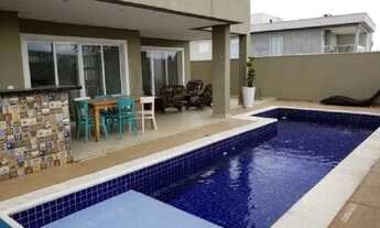 Imagem 4: Casa de condomínio para aluguel e venda possui 500 metros quadrados com 4 quartos