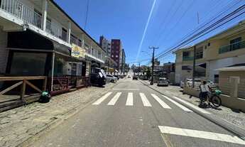 Imagem 2: Apartamento de 2 quartos, sendo uma suite, elevador, garagem coberta e sacada com churrasq