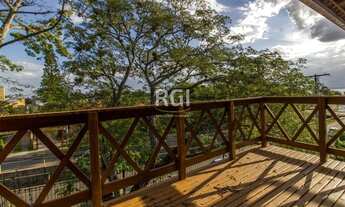 Imagem 2: Casa para venda com 250 metros quadrados com 3 quartos em Guarujá estuda imóvel e carros