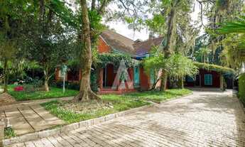 Imagem: Casa com 2 suíte(s) mais 2 quarto(s) à