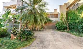 Imagem 2: Casa de 380m2 com 4 suítes e piscina no bairro Cristal