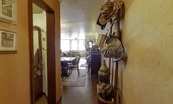 Imagem 3: Apartamento amplo em andar alto bem iluminado, ensolarado e decorado, com