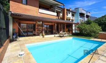 Imagem: Casa com 4 dormitórios, sendo 1 suíte