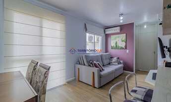 Imagem 3: Apartamento com 2 dormitórios e 1 vaga de garagem escriturada no Bairro Humaitá