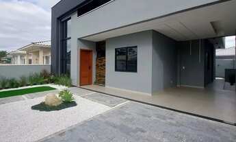 Imagem 6: Casa com 3 dormitórios sendo uma suíte, com piscina.