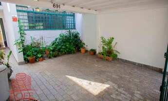 Imagem 2: Casa com 3 quartos, quintal e churrasqueira em rua arborizada do Brooklin (SP