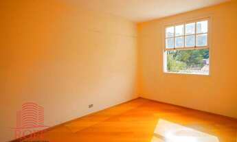 Imagem 6: Casa com 3 quartos, quintal e churrasqueira em rua arborizada do Brooklin (SP