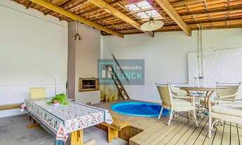 Imagem 2: Casa mobiliada com 3 suíte, 228m², piscina, 2 vagas no Três Figueiras - Porto Alegre - RS