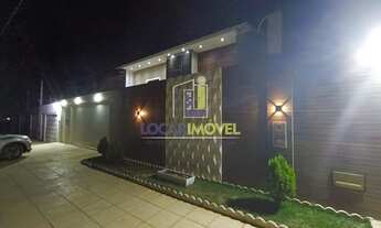 Imagem: Casa com 5 quartos sendo 3 suítes, área