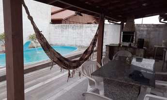 Imagem: Casa de três dormitórios com piscina para