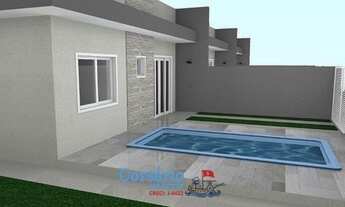 Imagem 7: Casas próximas ao mar em Praia de Leste