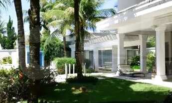 Imagem 4: Jardim Acapulco Guarujá, casa com amplo espaço de lazer