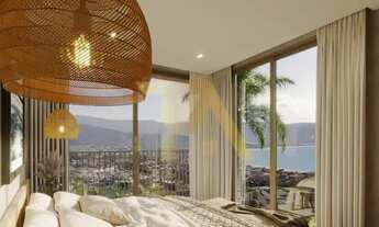 Imagem 6: Casa contemporânea com vista eterna para o mar em Garopaba