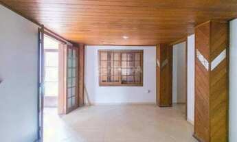 Imagem 6: Casa com 5 dormitórios, sendo 1 suíte, com pátio no bairro Cavalhada