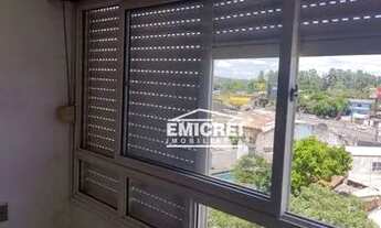 Imagem 3: EMICREI VENDE Kitnet semimobiliado, de frente, com dormitório/sal/cozinha conjugados Centr