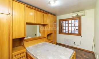 Imagem 6: Casa Residencial com pátio, 3 dormitórios, mobiliada, 2 vagas de garagem cobertas, no Bair