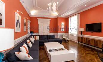 Imagem 2: Apartamento reformado com pé-direito alto