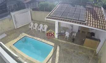 Imagem 2: Casa com 4 dormitórios - venda por R$ 1.060.000,00 ou aluguel por R$ 4.930,00/mês - Vila S